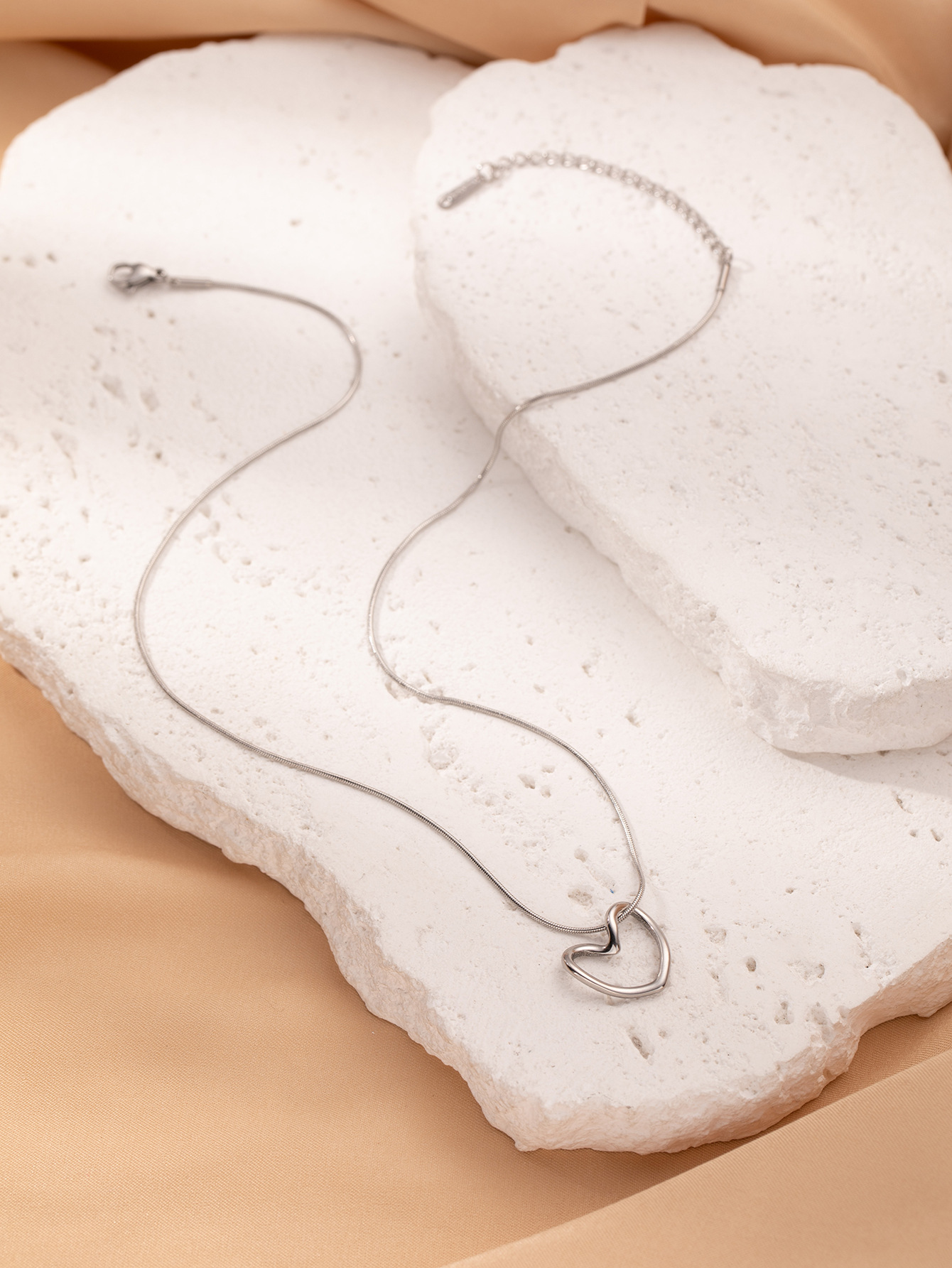 Collier cœur irrégulier argenté